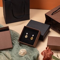 Boîte d'emballage de bijoux noire en gros d'usine boîte à bijoux en Carton de couverture de ciel et de terre brun noir avec éponge noire