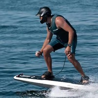 Planche de surf électrique durable 2025 en fibre de carbone avec moteur 1200KW pour le surf par tous les temps