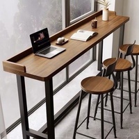 Table haute en bois massif pour salons de thé et balcons, style nordique, avec chaises mobiles intégrées pour séparation de fenêtre