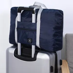 Sacs de voyage portables pliables à bandoulière, valise de couleur unie, ensemble de sacs de rangement de voyage grande capacité, chariot, sac d'avion