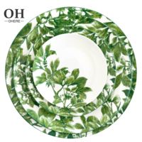 Service de table en porcelaine fine à motif feuilles vertes, assiette de présentation vert frais champêtre pour mariage, logo personnalisable, assiette en céramique pour événements et location
