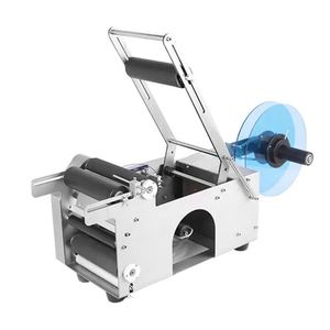Nouvelle machine d'étiquetage manuelle pour bouteilles rondes, pour les produits alimentaires, les boissons, les produits chimiques, les cosmétiques - Product Image 1