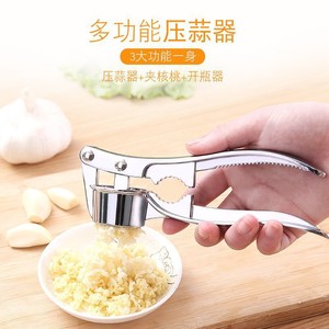 Multi Functional Garlic Press Stainless Steel Manual Garlic Crusher With Nut Cracker And <b>Bottle</b> Opener Kitchen Tool - Product Image 1