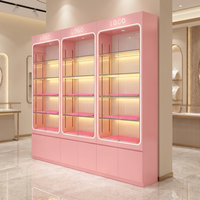 Vitrine de présentation en verre rose personnalisée avec éclairage LED, pour cosmétiques et parfums, avec armoires de rangement pour les magasins de beauté et les boutiques de détail