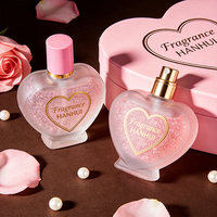 Flacon de parfum élégant en verre givré en forme de cœur avec accents dorés, logo personnalisé, support OEM ODM
