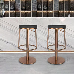 Restaurants and hotels feature modern rose gold stainless steel bar <b>stools</b> with swivel bases and <b>height</b>-<b>adjustable</b> ottoman legs - Product Image 5