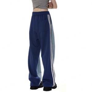 กางเกงจ็อกเกอร์ลำลองสไตล์ยูนิเซ็กส์แบบสวมใส่สบายทรงโอเวอร์ไซส์ มีเชือกผูกเอว แต่งผ้าต่อกัน สไตล์สตรีทแวร์ กางเกงวอร์มทรงหลวมสำหรับผู้ชาย ขายส่ง - Product Image 4