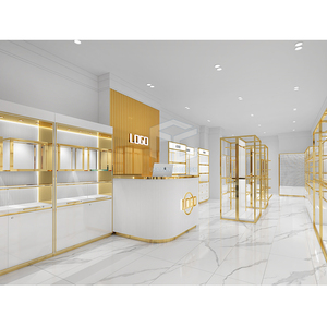 Décoration de magasin de vêtements haut de gamme présentoir de vêtements en or personnalisé fourni conception de magasin de vêtements complète - Product Image 1