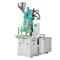 Machine de moulage par injection plastique verticale de haute précision pour la production de jetons de poker et de jetons de jeu en ABS