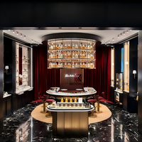 Présentoir suspendu rond en verre LED haut de gamme pour boutique de parfums et îlot de présentation de parfums pour boutique de fragrances de luxe