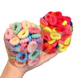 100 corbatas en caja para niños, bandas elásticas de pulgar coloridas, anillos de toalla pequeños para bebés, accesorios para el cabello - Product Image 5