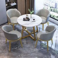 Petite table à manger italienne légère et moderne de luxe Combinaison de chaises en métal pour la maison, le bureau et l'appartement-pour la réception et les loisirs