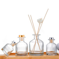 Vente en gros échantillon gratuit Flacon rond en verre vide de 50ml 100ml 150ml 200ml pour diffuseur de parfum avec bouchon en liège
