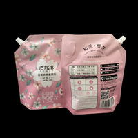 Pochettes biodégradables personnalisés pour boisson de jus de 1oz support d'emballage de boisson alimentaire liquide à eau claire pochette avec bec verseur sac lotion en mylar