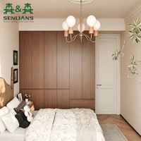 Armoire de chambre moderne en noyer avec portes de placard intégrées, tiroirs bas et rangement mural complet