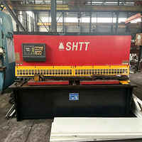 Kullanılmış Çok Fonksiyonlu Hidrolik CNC Kesme Makinesi Metal Levha Sabit Uzunlukta Kesme Makinesi Asansör Kabin Kapısı İşleme İçin