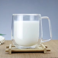 Vente en gros Tasse à café en verre borosilicaté à haute teneur en borosilicate Tasse à eau pour le petit déjeuner avec poignée