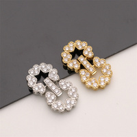 Vente en gros de fermoirs plaqués or 18 carats en laiton de Guangdong pour la fabrication de colliers de perles