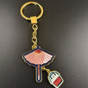 Porte-clés Fan & Sac en émail souple plaqué or avec impression UV pour le Carnaval, les festivals de musique, les concerts et les souvenirs d'entreprise - Product Image 1