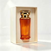 Nouveau flacon de parfum en verre coloré semi-translucide à découpe géométrique unique de 100 ml avec bouchon doré, logo personnalisé et boîte cadeau