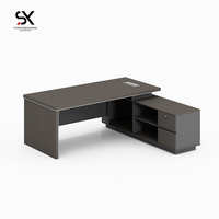 Bureau de direction moderne en bois de luxe de niveau E0 en forme de L Nouveau mobilier de bureau Design pliable pour Home Manager CEO Boss Office