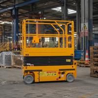 Plateforme élévatrice à ciseaux électrique sur chenilles en acier de 14 m GS1212TL, capacité de 450 kg, avec extension de 900 mm pour la construction d'installations