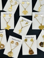 Kalung Liontin Bunga Baja Tahan Karat 2026 Anting Cincin Vintage Chic Tahan Air Set Perhiasan Pesta Hadiah