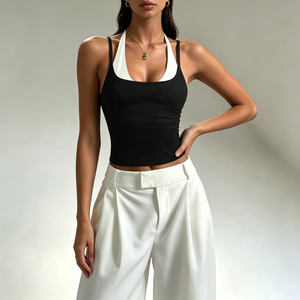 Top corto casual de punto sin mangas con cuello halter y lazo, ajustado, elástico, de dos piezas simuladas, liso, en blanco y negro, para mujer - Product Image 2