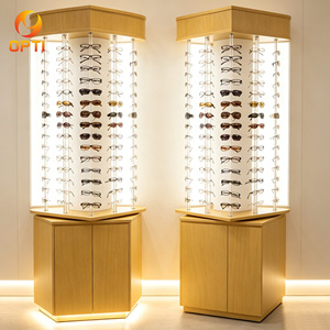 Mobiliario de Alta Gama para Ópticas |   Exhibidor Giratorio de Gafas de Madera con Iluminación LED Trasera y Almacenamiento - Product Image 1