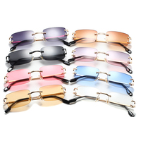 2023 lunettes de soleil sans monture tendance femmes Uv400 Cool métal jambes graduent Vintage rétro dames lentilles carrées petites lunettes 2023