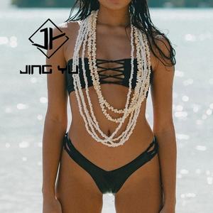 ชุดว่ายน้ำบิกินี่ไมโครแบบผูกโบว์ สีพื้น ดีไซน์เว้า  ทำจากไนลอนรีไซเคิลสุดหรู - Product Image 1