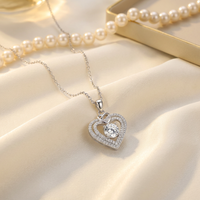 Nouveau collier pendentif cœur en moissanite taille brillant ronde 6,5 mm 1 carat en argent sterling 925 pour femme, bijoux certifiés GRA