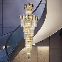 Lustre de luxe en cristal gris avec finition dorée pour escalier de villa Lustre en cristal pour haut plafond éclairage
