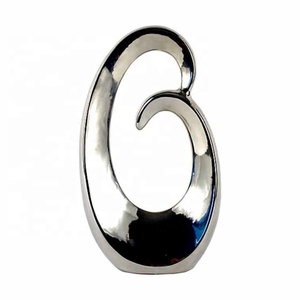 Escultura en Espiral de Pudín de Ciruela - Product Image 1