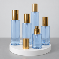 Flacon pulvérisateur en aluminium doré 100ml 150ml 200ml, atomiseur à fine brume en PET bleu, emballage de parfum de luxe OEM