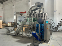 Machine d'emballage et de pesage intégrée pour cacahuètes, snacks enrobés, chips de pommes de terre, snacks soufflés, contrôle PLC