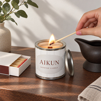 Bougie parfumée légère en métal personnalisée AIKUN avec mèche en bois unique et couvercle imprimé pour la vente au détail en boutique