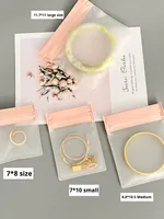 Sac en plastique zippé personnalisé rose pour petits bijoux, sac zippé mat mignon pour boucles d'oreilles, sac en PVC réutilisable avec logo, mini pochette