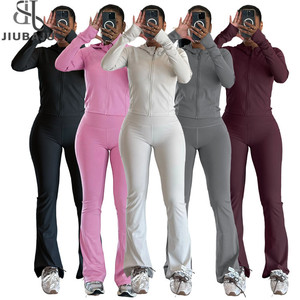 Модный спортивный женский комплект из 2 предметов, однотонные куртки и брюки с длинным рукавом и капюшоном - Product Image 1