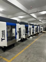 Centre d'usinage CNC T700H à changeur d'outils automatique, capacité de table 250 kg et déplacement 700x400x320 mm, pour composants en acier de machines