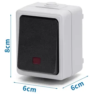 Interruptor de montaje en superficie de 1 vía y 1 salida, color gris, ideal para controlar la iluminación en espacios interiores. - Product Image 1