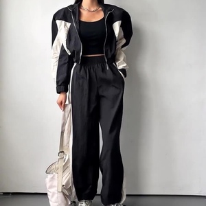 ชุดเสื้อแขนยาวและกางเกงขายาวสำหรับผู้หญิง สีตัดต่อ สไตล์ลำลองเรียบง่าย ชุดกีฬาแห้งเร็ว 2 ชิ้น แฟชั่น - Product Image 3