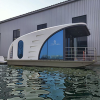 Capsule spatiale flottante, nouvelle maison mobile, maison flottante préfabriquée en acier pour maisonnette extérieure, maison-bateau de luxe