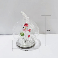 Adorno navideño de vidrio de borosilicato soplado a mano con iluminación LED con muñeco de nieve en el interior para decoración festiva