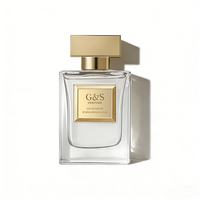 Flacon de parfum de luxe pour homme, boîte en verre 100 ml, forme plate avec logo personnalisé, design unique vert et or, par le fabricant
