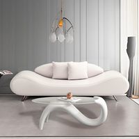 Ensemble de canapés en cuir courbé de luxe avec table basse à ruban, mobilier de salon moderne et organique, canapé design