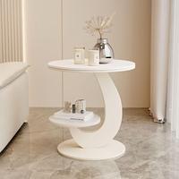 Table basse ronde à deux niveaux avec étagères de rangement ; table d'appoint en métal avec cadre incurvé ; idéale pour les petits salons et chambres à coucher