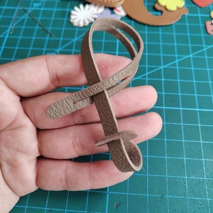 Stylish and minimalist PU leather lanyard keychain, belt <b>bag</b> <b>charm</b>, niche PU leather rope doll accessory. - Product Image 2