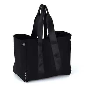 2023 गर्म बेच नई डिजाइनरों शॉपिंग हैंडबैग काले छिद्रित Neoprene महिलाओं समुद्र तट ढोना बैग