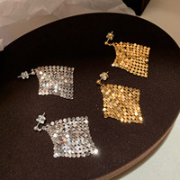 Boucles d'oreilles pendantes en maille tressée dorée et argentée effet tapis magique avec pompons pour femme, bijoux fantaisie, vente en gros